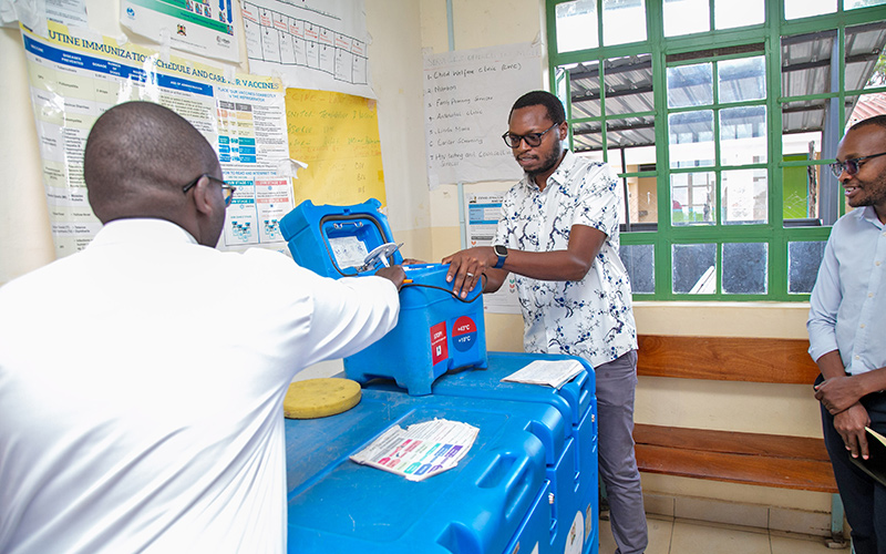 Customer handing over parcel to worker